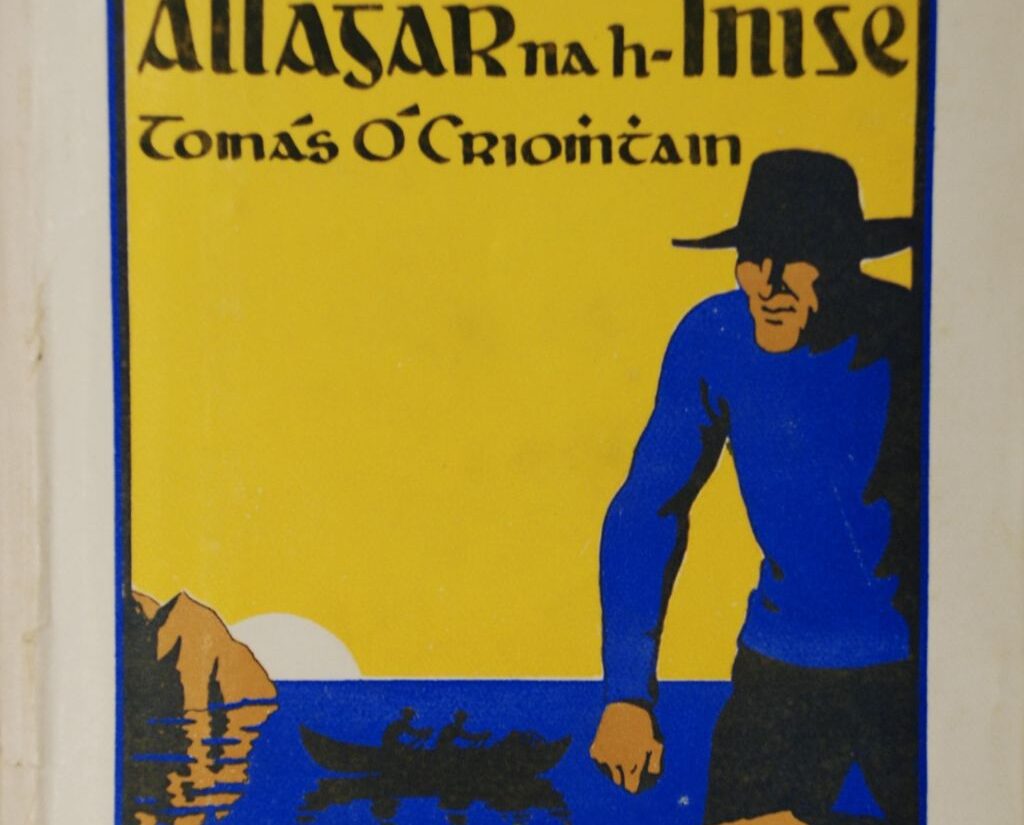 The front cover of Allagar na hInise shows a man by rocks near the sea.