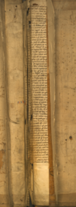 Manuscript fragments in the spine binding of 'The Lives of the Noble Grecians and Romanes.'
