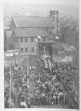 A photograph from "Franciscan Cork: A Souvenir of St. Francis Church, Cork " of crowds attending Mass on the day of laying the foundation stone for the new St Francis Church.