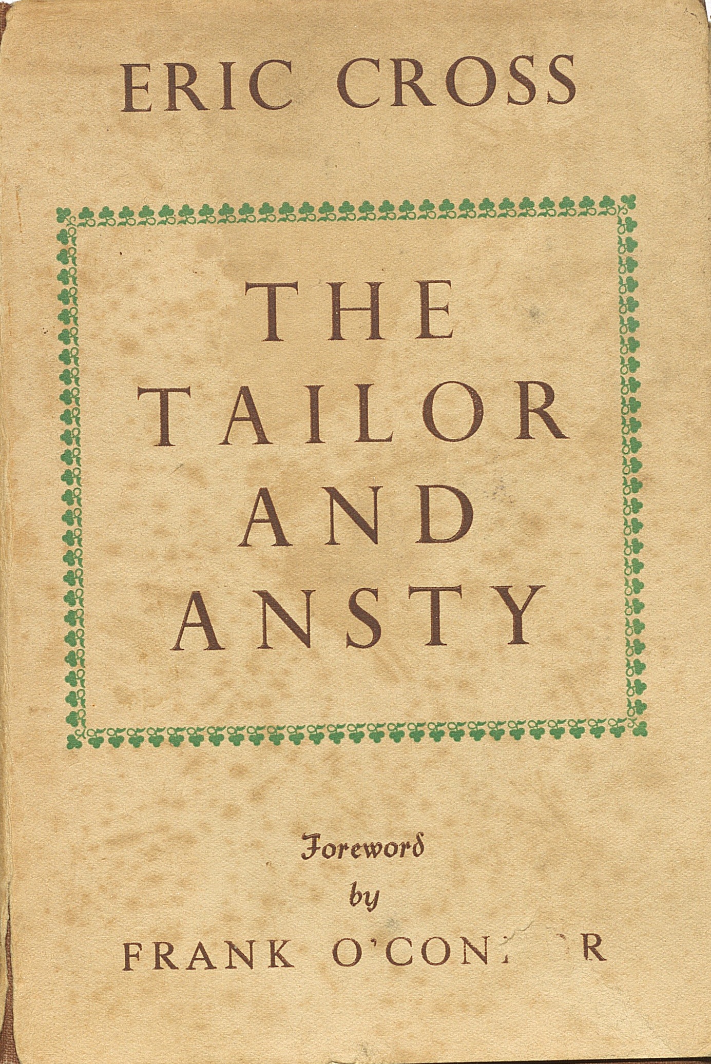 Front cover to the 1942 publication of The Tailor and Ansty. The cover is beige with a green design around the title. 