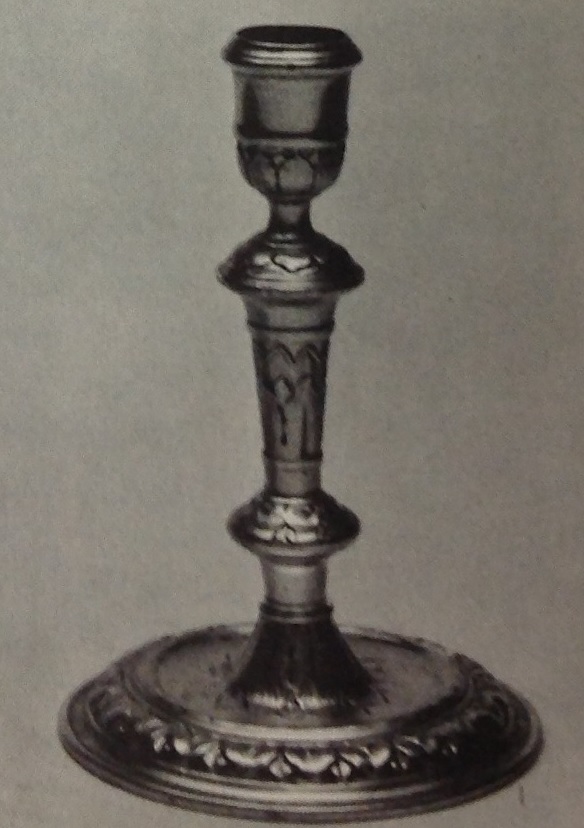 Silver candlestick holder.
