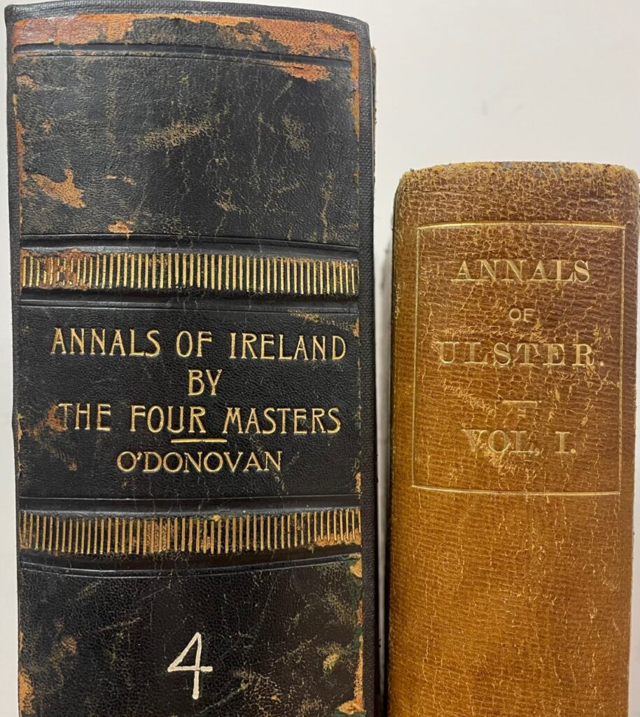 Spine bindings of 'Annals of Ireland by the Four Masters' edited by John O'Donovan Volume 4 and the Annals of Ulster Volume 1