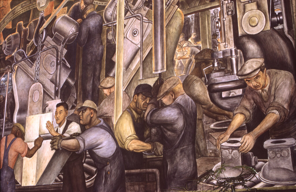 Mural of automotive industry workers in Detroit. Colour photo by Alen MacWeeney. Black History Month.